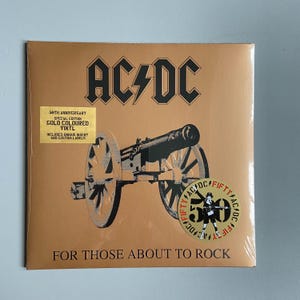 AC/DC - For thise about to rock アルバム レア 50 周年記念 ゴールド ビニール + 特典 新品 & 未開封、メタル 記念品 ビニール レコード 販売中