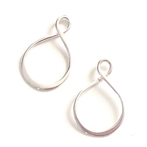 May include: Two silver-toned metal earring findings with a teardrop shape and a loop at the top.