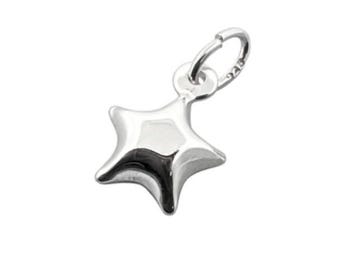 May include: A silver charm in the shape of a star with a loop for attaching to a bracelet or necklace.