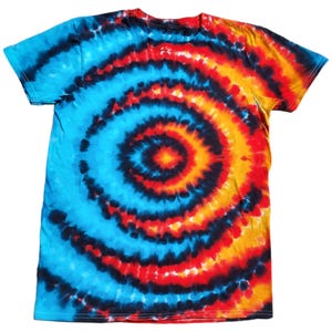 May include: A tie-dye t-shirt with a blue, orange, red and black spiral pattern.