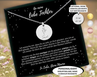 May include: A silver necklace with a round pendant featuring a delicate floral design and the name "Sarah" engraved on it. The necklace comes in a black box with a message for a daughter, including the text "An meine liebe Tochter" and "In Liebe, Deine Mama".