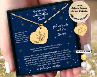 May include: A gold heart-shaped necklace with a small flower design and the name "Sarah" engraved on it. The necklace is in a blue box with a message that reads "Go and reach for the stars!" and "We wish you that you believe deep in your heart that you can achieve everything in life!"