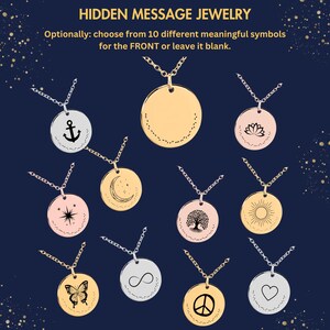 May include: Ten different necklace pendants with various symbols, including an anchor, moon, star, tree, sun, butterfly, infinity sign, peace sign, heart, and lotus flower. The pendants are on a blue background with gold and silver chains.
