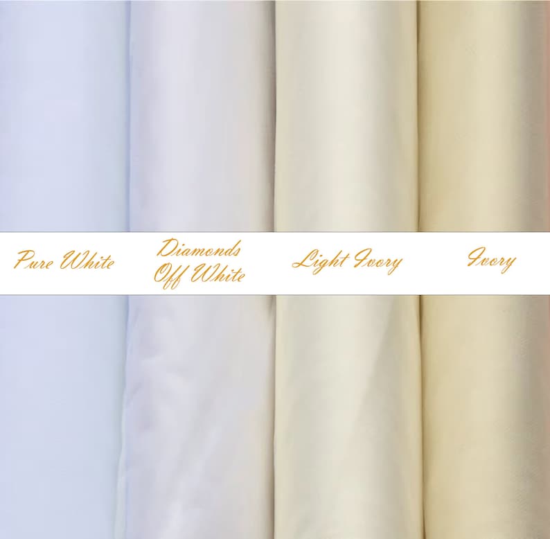 May include: Four vertical fabric rolls displayed side-by-side in varying shades of white and cream. A horizontal white band across the center features the gold text labels: Pure White, Diamonds Off White, Light Ivory, and Ivory.