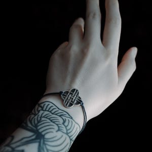 Silver HUNTRIX Friendship Bracelet from KPOP Demon Hunters