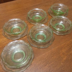 Art Deco Uranium Glass bowls and saucers x 6