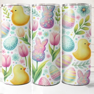 May include: Three stainless steel tumblers with a white background and a colorful Easter pattern. The pattern includes pastel colored eggs, chicks, bunnies, and flowers.