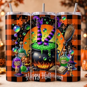 May include: A cylindrical tumbler with a straw featuring a Halloween design on an orange and black buffalo plaid background. The graphic shows a black cauldron with green bubbling liquid, witch legs, potion bottles, a broom, and a skull.