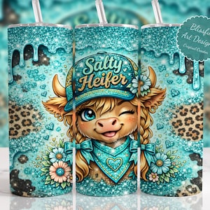 May include: A turquoise tumbler with a cartoon cow wearing a hat that says "Salty Heifer." The tumbler has a glittery design with a leopard print pattern and a straw. The design includes flowers and hearts.