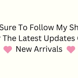 May include: Text graphic with pink hearts on either side that reads "Be Sure To Follow My Shop For The Latest Updates On New Arrivals"