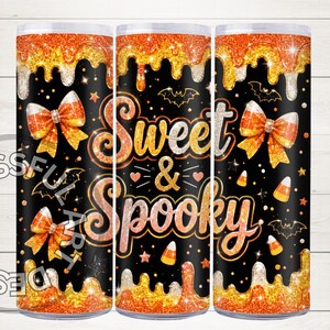 May include: A cylindrical tumbler featuring a black background with orange and gold glitter drips. The design includes the text "Sweet & Spooky" in glittery orange lettering, surrounded by candy corn bows, small bats, stars, and candy corn pieces.