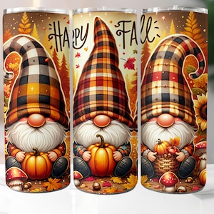 May include: A set of three stainless steel tumblers featuring a fall-themed design. Each tumbler showcases a gnome with a plaid hat, holding a pumpkin or basket of pumpkins, with the words "Happy Fall" in a whimsical font. The background includes autumn leaves and mushrooms.
