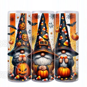 May include: Three Halloween-themed tumblers featuring gnome illustrations. Each gnome wears a black witch hat with candy corn and pumpkin details. They hold drinks and are surrounded by pumpkins, bats, and candy corn. The background has orange and white stripes.