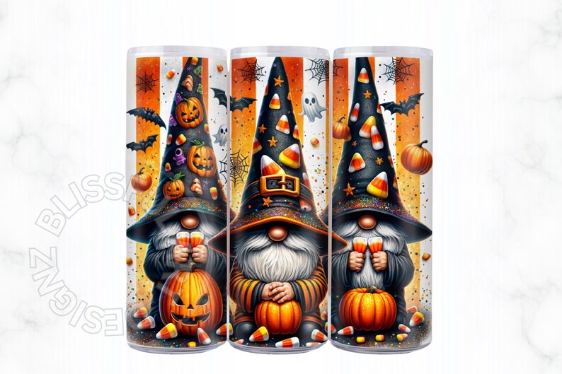 May include: Three Halloween-themed tumblers featuring gnome illustrations. Each gnome wears a black witch hat with candy corn and pumpkin details. They hold drinks and are surrounded by pumpkins, bats, and candy corn. The background has orange and white stripes.