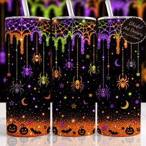 May include: Three cylindrical tumblers with clear straws featuring a black background with glittery orange, purple, and green spiderwebs, hanging spiders, stars, and crescent moons. The base has orange glitter with black jack-o'-lanterns and bats.