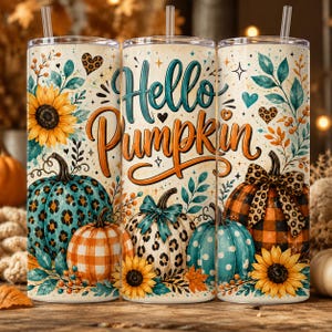 May include: Three cylindrical tumblers with straws featuring a fall theme. The design includes the text Hello Pumpkin in teal and orange, decorated with sunflowers, teal and orange pumpkins, leopard print patterns, and small hearts on a cream background.