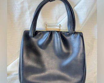 Elegante bolso vintage de piel negra