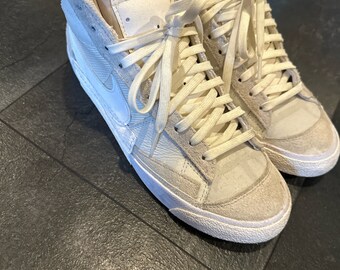 Worn shoes by Boys 24 & 28