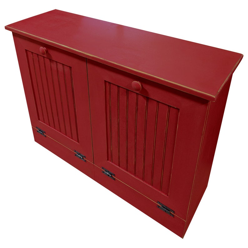 May include: A red wooden double-door trash can with black hinges. The doors have vertical slats and a knob on each door.
