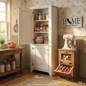 May include: A white kitchen pantry with an open door, filled with jars and canned goods. A wooden sign with "HOME - Sweet Home" hangs on the wall. A wooden potato bin with potatoes and onions is next to a stand mixer.