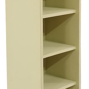 May include: A tall, off-white wooden bookcase with six shelves. The bookcase has a simple design with no visible hardware.