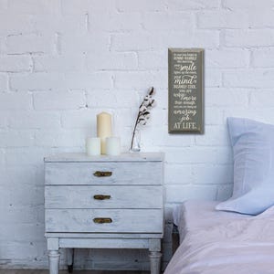 May include: A wooden sign with a gray background and white text. The sign reads: "In case you forget to remind yourself this morning, smile, your mind is insanely cool, you are way more than enough, and you are doing an amazing job at life."