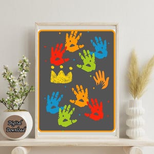May include: A printable digital download featuring a colorful design of handprints in various colors, including red, orange, yellow, green, blue, and purple. The handprints are arranged in a random pattern on a dark gray background. A yellow crown is at the top of the design.