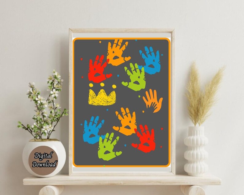 May include: A printable digital download featuring a colorful design of handprints in various colors, including red, orange, yellow, green, blue, and purple. The handprints are arranged in a random pattern on a dark gray background. A yellow crown is at the top of the design.