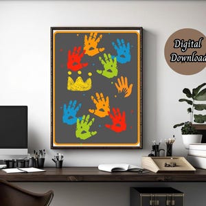 May include: A digital download of a printable art print featuring a gray background with colorful handprints and a yellow crown. The handprints are in shades of red, orange, yellow, green, blue, and purple.