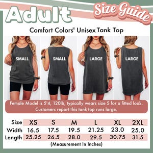 May include: An adult Comfort Colors unisex tank top size guide featuring four images of a dark gray tank top in small and large sizes. Includes a table with width and length measurements in inches for sizes XS through 2XL and model sizing notes.