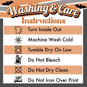 May include: A rectangular washing and care instructions sign with a Halloween theme featuring bats and orange, white, and gray stripes. The text reads: Washing & Care Instructions, Turn Inside Out, Machine Wash Cold, Tumble Dry On Low, Do Not Bleach, Do Not Dry Clean, Do Not Iron Over Print.