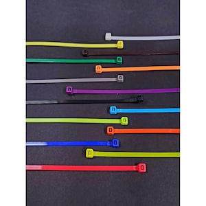 May include: Assortment of colorful cable ties in various colors, including white, yellow, green, brown, orange, gray, purple, black, blue, red, and lime green.