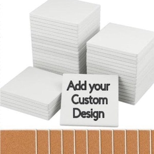May include: Stacks of white square coasters with a textured surface. One coaster displays the text "Add your Custom Design" in black. The coasters are arranged in stacks, suggesting a product for customization or bulk purchase.