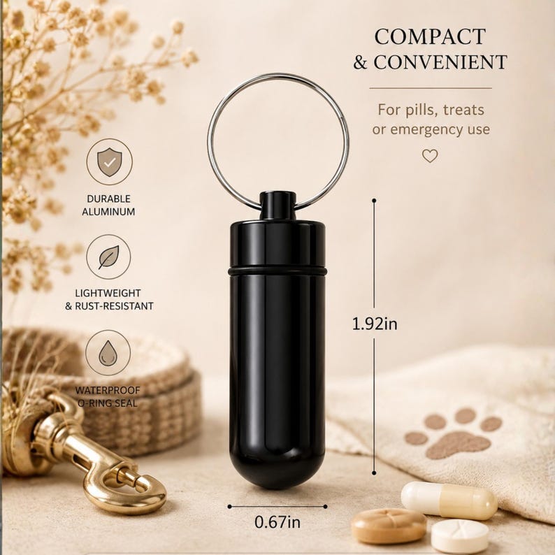 Black compact pet pill container with size measurements and icons highlighting waterproof lightweight travel design.