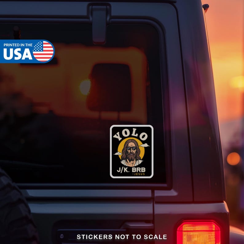 May include: A black and white sticker with the text "YOLO" above an image of Jesus wearing sunglasses. Below the image is the text "J/K. BRB - JESUS". The sticker is printed in the USA.