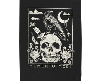 May include: Black and white illustration of a skull with a raven perched on top. A dagger is stuck in the skull, and a key hangs from a crescent moon above. The words "Memento Mori" are written below the skull.