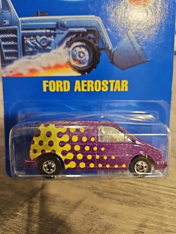 Hot Wheels Mattel Ford Aerostar No. 151 Purple/yellow #4695