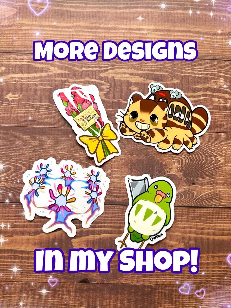 May include: Four colorful stickers featuring a bouquet of pink roses with a yellow ribbon, a cartoon cat with a Totoro-like creature on its back, a cluster of blue and pink coral-like shapes, and a green bird with a white belly and a knife.