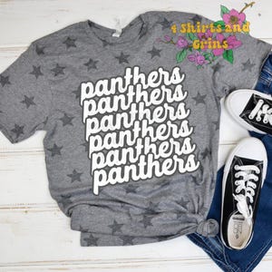 May include: Gray t-shirt with a star pattern and the word "Panthers" repeated six times in a white retro font.