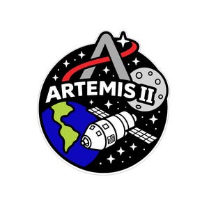 May include: A circular sticker featuring the Artemis II mission logo. The design includes a stylized 'A' with a red arc, the Earth, a spacecraft, the moon, and the text 'ARTEMIS II' in white.