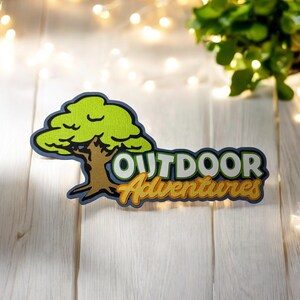 Abbellimento fustellato per album di ritagli "Outdoor Adventures" - completamente assemblato da cartoncino di qualità a strati