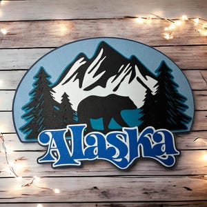 Abbellimento Alaska Die Cut - completamente assemblato da cartoncino di qualità a strati