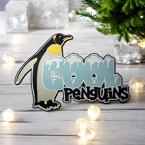 Abbellimento fustellato per album di ritagli con pinguini fantastici, completamente assemblato con cartoncino di qualità a strati