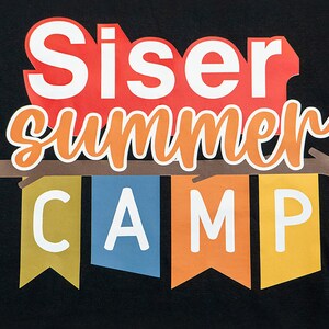 May include: A black t-shirt with a colorful summer camp logo. The logo features the words "Siser Summer Camp" with the word "Summer" in orange and the word "Camp" in colorful pennants.
