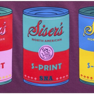 May include: Three red, yellow, and blue cans with a white label that reads "Siser's North American" and "S-PRINT SNA" in black text.