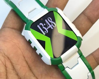 May include: A white and green smartwatch with a black screen displaying the time 13:48. The watch has a green border and a green and white band. The watch is held in a hand.