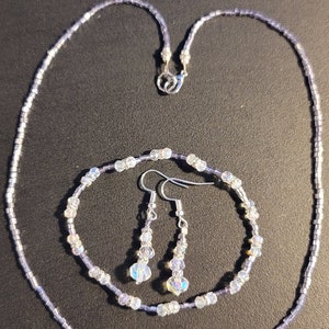 Purple beaded necklace bracelet earrings