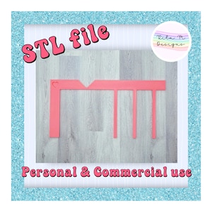 May include: A pink 3D printed tool featuring a flat horizontal bar with three vertical prongs and a corner section containing a small heart cutout. The image includes the text STL file and Personal & Commercial use with a Rita M Designs logo.