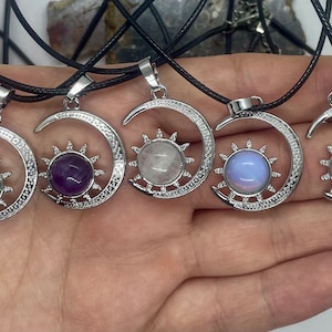 Crystal sun and moon necklaces