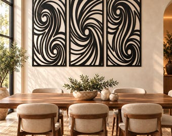 May include: Three rectangular wall art panels featuring black laser-cut designs with swirling, wave-like patterns. Each panel is framed in black and displays a continuous, intricate cutout motif that creates a bold contrast against the light wall.